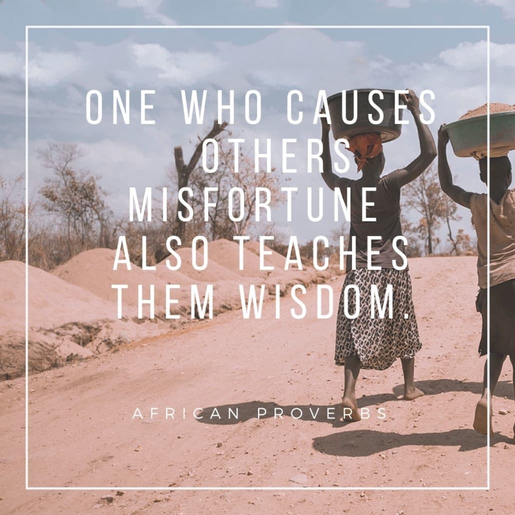 African proverbs on dusty road background