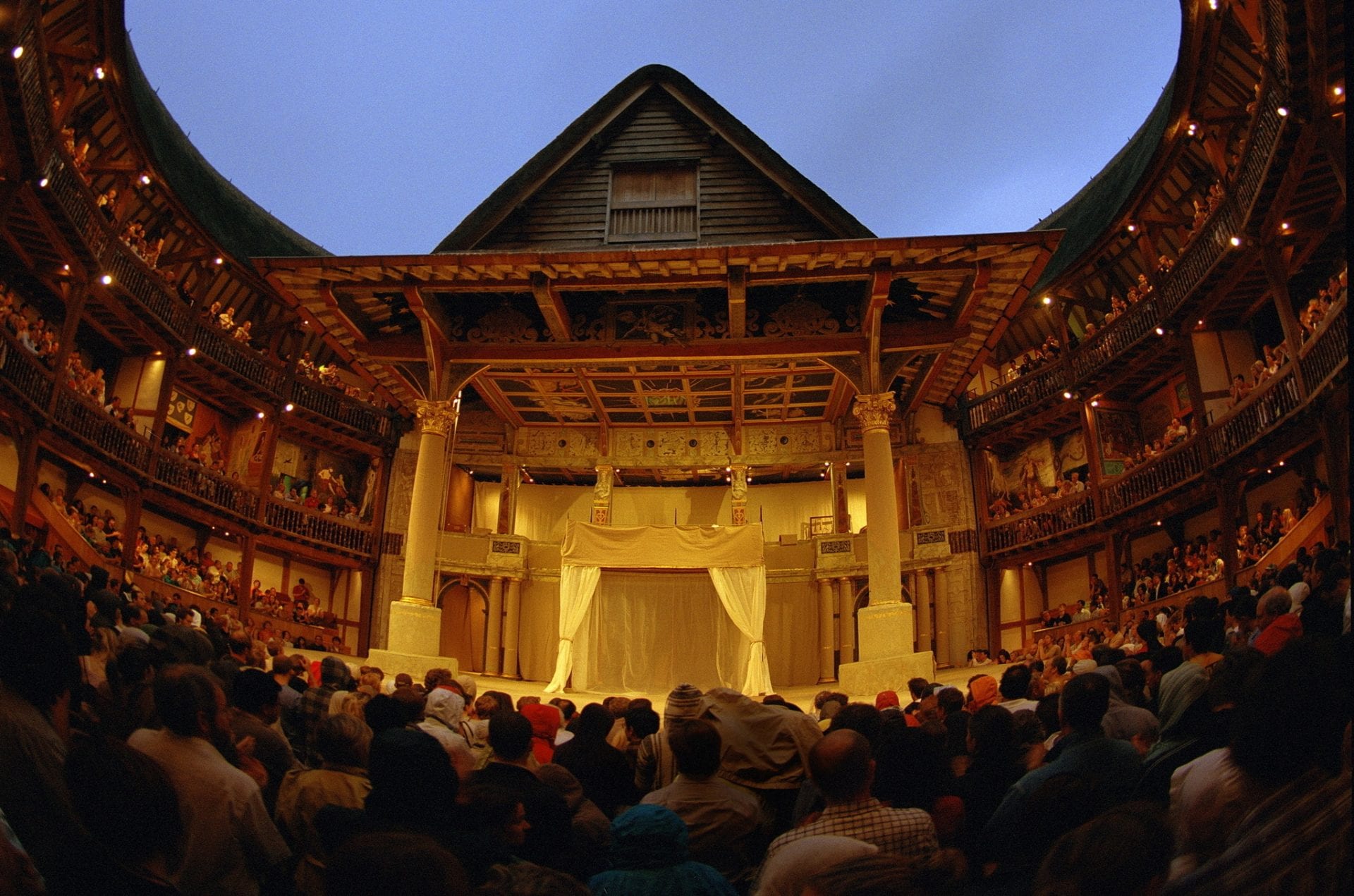 Interiot shot of the stage at Shakespeare' Globe Theatre today, by night