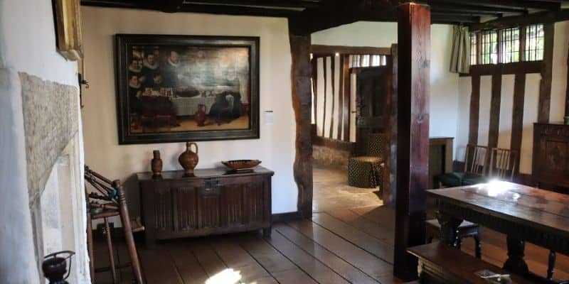 Entrance hallway at Hall's Croft, complete with Tudor furniture and paintings