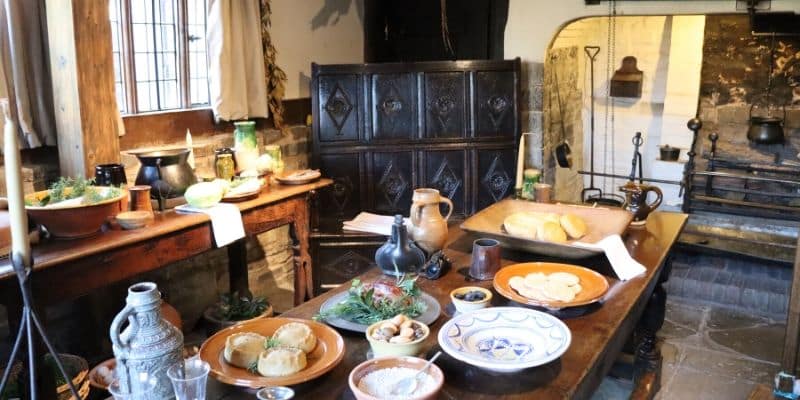 The kitchen at Hall's Croft, complete with Tudor meal laid out