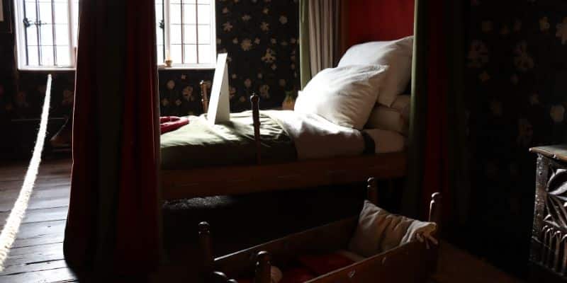 Shakespeare's parent's bedroom at the Henley Street House, featuring the bed Shakespeare was born
